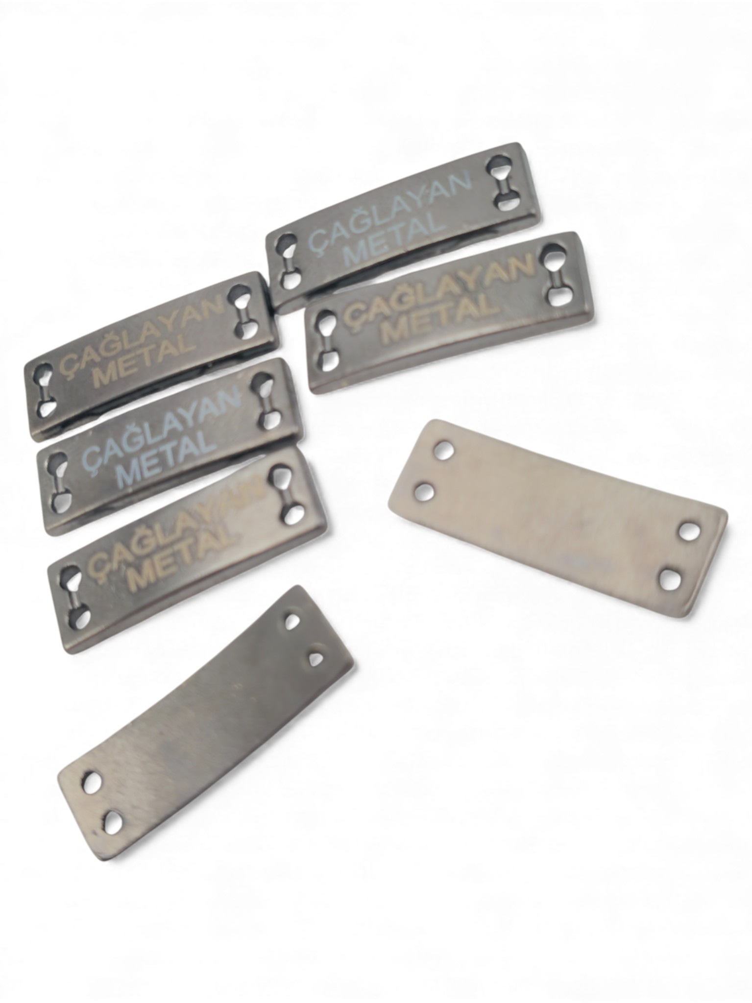 4 delikli Hafif Eğri Dikme etiket  21.5 mm x 7 mm E 1587