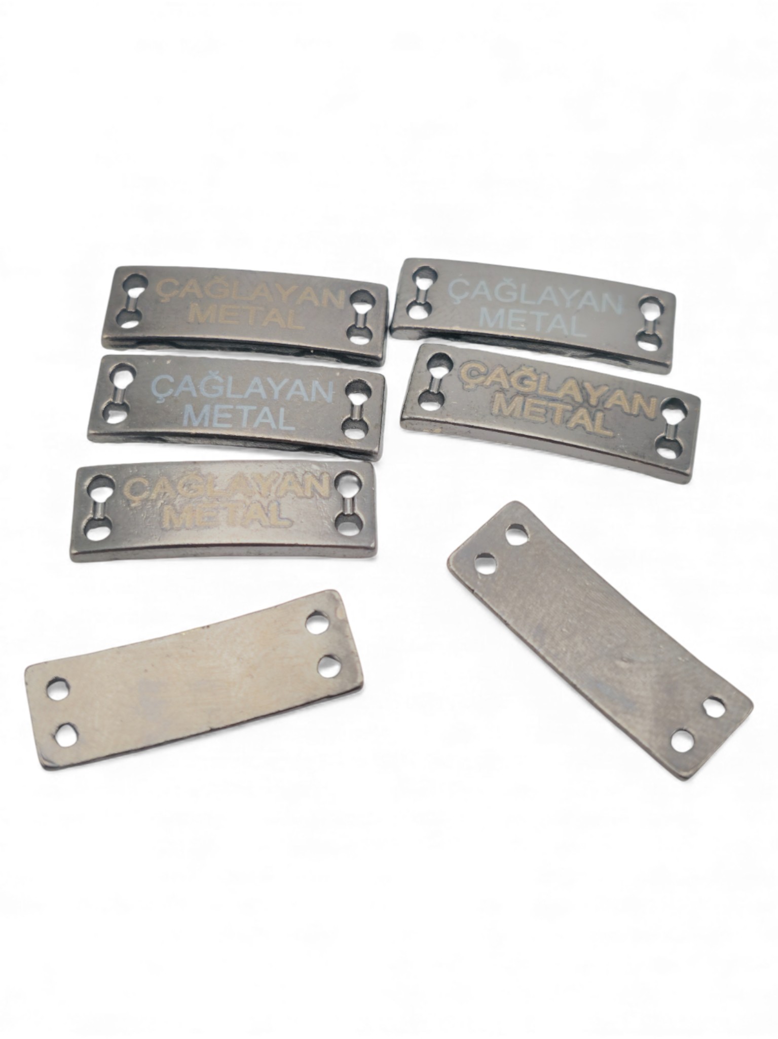 4 delikli Hafif Eğri Dikme etiket  21.5 mm x 7 mm E 1587